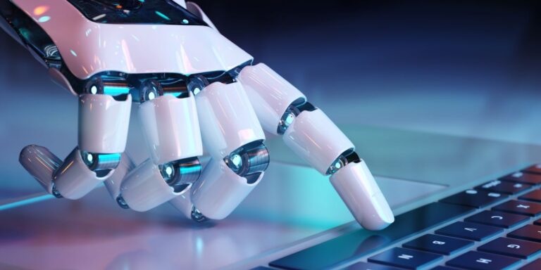 Within the Artificial Intelligence Landscape, an AI robotic hand types on a laptop keyboard