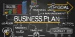Strategic business plan on a chalk board.