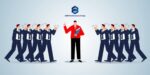 Illustration of a business leader in red surrounded by clapping team members, representing autocratic leadership and authoritative direction